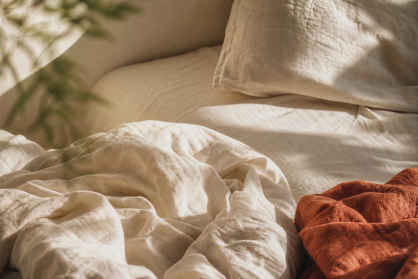 Early light falling across a linen surface, calm and uncluttered